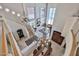 Bright foyer showcasing chandeliers, staircase, and a large doorway to the living room at 7667 E Krall St, Scottsdale, AZ 85250