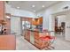 Spacious kitchen featuring wood cabinets, stainless steel appliances, and granite countertops at 7667 E Krall St, Scottsdale, AZ 85250