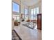 Bright living room with high ceilings and a cozy fireplace at 7667 E Krall St, Scottsdale, AZ 85250