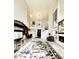 Open-concept living area with high ceilings and a view of the dining space at 7667 E Krall St, Scottsdale, AZ 85250