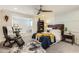 Cozy bedroom featuring a bed with a leather headboard and built in window seating at 77 E Missouri Ave # 7, Phoenix, AZ 85012