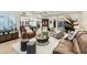 Spacious living room features neutral tones and an open-concept design with wood floors at 77 E Missouri Ave # 7, Phoenix, AZ 85012
