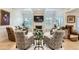 Comfortable living room with stone fireplace and a neutral color palette at 77 E Missouri Ave # 7, Phoenix, AZ 85012