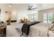 Inviting main bedroom showcasing a stone fireplace, a sitting area, and generous space at 77 E Missouri Ave # 7, Phoenix, AZ 85012