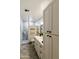 Bright bathroom showcases a walk-in shower, updated vanity, and tasteful decorations at 8354 E Emelita Ave, Mesa, AZ 85208