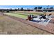 Outdoor bocce ball court featuring synthetic turf with benches, trash receptacles, and seating at 8354 E Emelita Ave, Mesa, AZ 85208