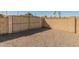 Spacious backyard area featuring a gate and a block wall for privacy at 8648 N 37Th Ave, Phoenix, AZ 85051