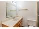 Clean bathroom featuring a vanity with storage, a mirror, and a shower with glass door at 8648 N 37Th Ave, Phoenix, AZ 85051