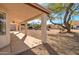 Covered patio with view of backyard at 9437 E Champagne Dr, Sun Lakes, AZ 85248