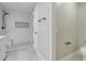 Beautifully renovated bathroom features contemporary fixtures, a modern shower, and storage space at 9437 E Champagne Dr, Sun Lakes, AZ 85248