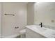 Bathroom showcasing a white marble vanity and modern black fixtures at 9437 E Champagne Dr, Sun Lakes, AZ 85248