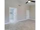Bedroom with modern flooring, closet space, and an en suite bathroom at 9437 E Champagne Dr, Sun Lakes, AZ 85248