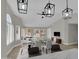 Bright dining room with a modern table set, perfect for entertaining guests at 9437 E Champagne Dr, Sun Lakes, AZ 85248