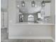 Modern kitchen featuring white cabinets, quartz countertops, and stainless steel appliances at 9437 E Champagne Dr, Sun Lakes, AZ 85248