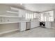 Bright open concept kitchen with stainless steel appliances and white marble counter tops at 9437 E Champagne Dr, Sun Lakes, AZ 85248