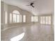 Spacious living room filled with natural light with large windows and patio door access at 9437 E Champagne Dr, Sun Lakes, AZ 85248