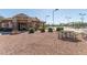 Well-maintained fitness center surrounded by desert landscaping and picnic tables at 11525 E Laguna Azul Cir, Mesa, AZ 85209
