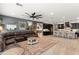 Spacious living room flowing into the open kitchen, perfect for entertaining guests at 12539 W Tuckey Ln, Glendale, AZ 85307