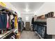 Spacious walk-in closet with custom shelving and ample storage at 12539 W Tuckey Ln, Glendale, AZ 85307