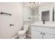 Bright bathroom featuring a toilet and a white vanity with sleek black hardware at 1421 E Hopkins Rd, Gilbert, AZ 85295