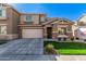Attractive two-story home with a spacious driveway and a well-maintained front yard at 1421 E Hopkins Rd, Gilbert, AZ 85295