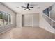 Open living room with tile floors, neutral walls, and stairs, perfect for entertaining guests at 1421 E Hopkins Rd, Gilbert, AZ 85295