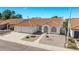 Aerial view of a charming neighborhood with well-manicured lawns and a beautiful lake at 1470 S Villas Ct, Chandler, AZ 85286