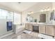 Bright bathroom featuring a shower, soaking tub, and double sink vanity with neutral finishes at 1470 S Villas Ct, Chandler, AZ 85286