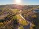 Picturesque aerial view of a desert golf course, showcasing winding paths and beautiful greens at 16341 E Links Dr, Fountain Hills, AZ 85268