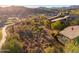 Aerial view of the back of the house highlighting the deck and golf course location at 16341 E Links Dr, Fountain Hills, AZ 85268