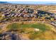 Aerial view of a home nestled in a golf community with desert landscaping and mountain views at 16341 E Links Dr, Fountain Hills, AZ 85268