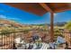 Charming outdoor seating area with scenic views of a desert landscape and golf course at 16341 E Links Dr, Fountain Hills, AZ 85268