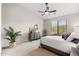 Inviting bedroom with a view of the natural landscape and a neutral color palette at 16341 E Links Dr, Fountain Hills, AZ 85268