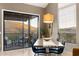 Dining area with balcony access and views of the desert and mountains at 16341 E Links Dr, Fountain Hills, AZ 85268
