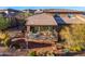 View of the back of the house showcasing the large outdoor deck at 16341 E Links Dr, Fountain Hills, AZ 85268