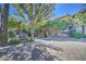 Beautiful exterior shot of Biltmore Square Condominiums showcasing lush greenery and a well-maintained entrance at 1701 E Colter St # 191, Phoenix, AZ 85016