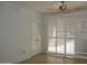 Bright bedroom featuring modern window shutters and a ceiling fan at 1701 E Colter St # 191, Phoenix, AZ 85016