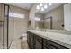 Bathroom featuring granite countertop, glass shower, and tile flooring at 1727 E Hidalgo St, Apache Junction, AZ 85119
