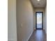 Interior foyer with tile flooring and an ornate frosted glass front door at 1727 E Hidalgo St, Apache Junction, AZ 85119