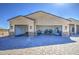 Spacious three-car garage featuring ample storage and a durable, stylish paved driveway at 1727 E Hidalgo St, Apache Junction, AZ 85119