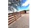 View of horse property featuring fencing, a shelter, and scenic natural surroundings, offering a tranquil setting at 1727 E Hidalgo St, Apache Junction, AZ 85119
