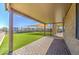 View of the covered patio area overlooking the lawn at 1727 E Hidalgo St, Apache Junction, AZ 85119