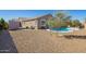 Spacious backyard with a refreshing pool, desert landscaping, and privacy at 18006 W Hess St, Goodyear, AZ 85338