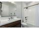 Bathroom featuring a vanity with a sink and a shower with a shower curtain at 18006 W Hess St, Goodyear, AZ 85338