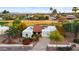 A beautiful front exterior view featuring a red tile roof, desert landscaping, and an inviting driveway at 18727 E Avenida Del Ray --, Rio Verde, AZ 85263