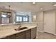 The updated kitchen features stainless steel appliances and white countertops at 1930 E Hayden Ln # 118, Tempe, AZ 85281