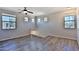 This loft features hard surface floors, a ceiling fan, and natural light at 1930 E Hayden Ln # 118, Tempe, AZ 85281