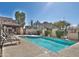 Inviting community pool with lounge chairs and shaded area for residents to relax and enjoy the outdoors at 1930 E Hayden Ln # 118, Tempe, AZ 85281
