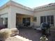 Covered patio space with comfortable seating, a grill, and views of the surrounding landscape at 19420 N Westbrook Pkwy # 510, Peoria, AZ 85382