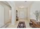 Bright foyer with tile flooring, neutral walls, decorative furniture, and a view of the front door at 24822 S Sedona Dr, Sun Lakes, AZ 85248